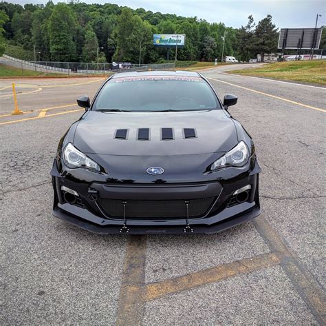 Verus engineering - The Verus Engineering Composite Adjustable Front Splitter is extremely versatile, four splitter sizes in one! With the ability to extend the front splitter between 2 and 5 inches from the front bumper, the splitter can balance a variety of rear aerodynamic devices. 